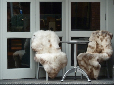 Reindeer fur covered chairs for smokers in London's chilly pre Christmas weather