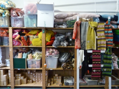 Amazing stuffed shelves and the new scarves featuring Scandinavian style houses from Donna Wilson for winter 2011
